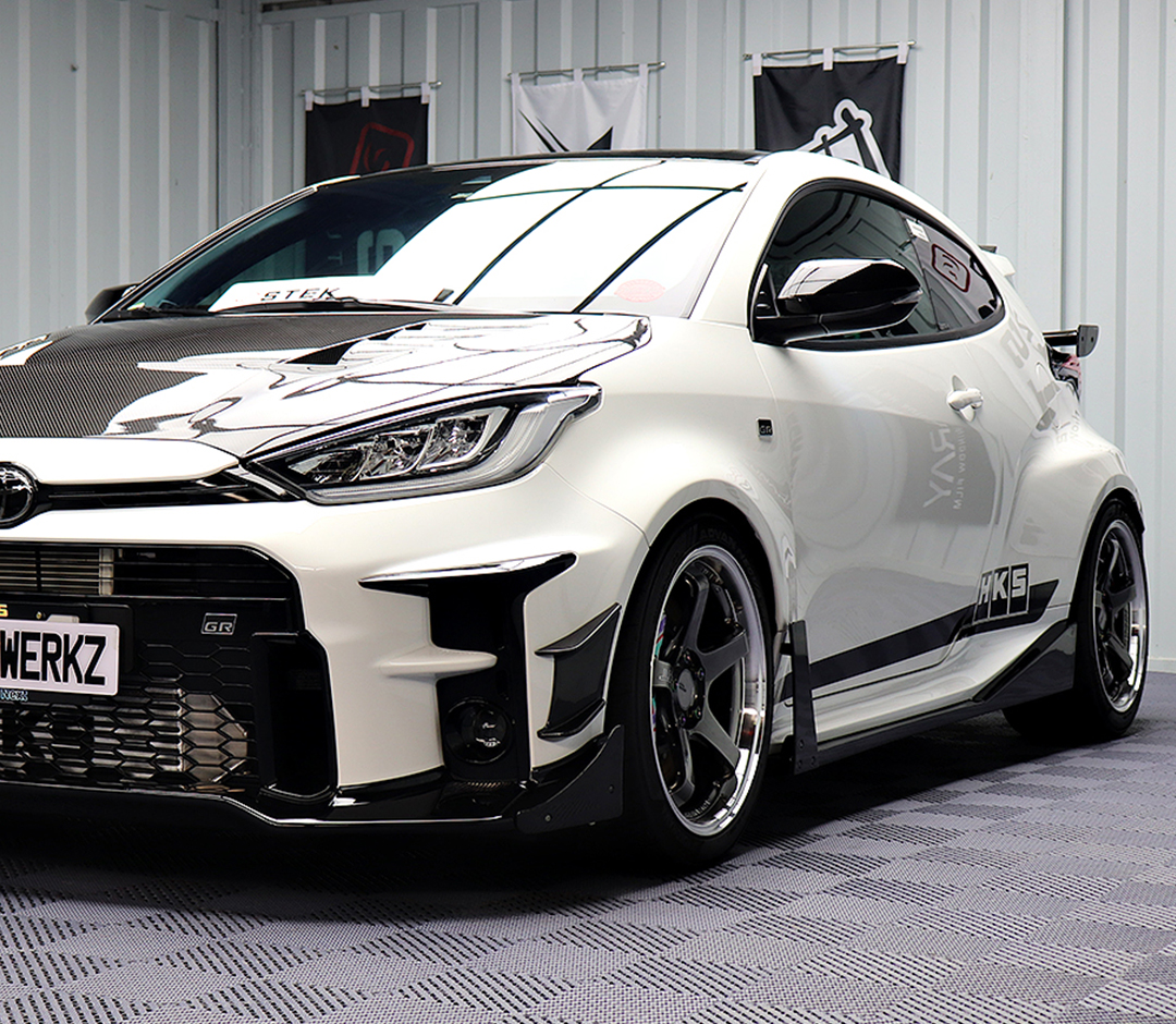 White XstaticWerkz vehicle protected with STEK paint protection film